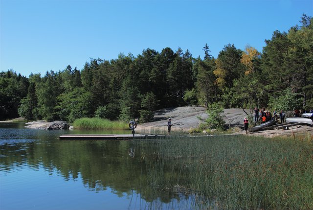 Hauling canoes into the water