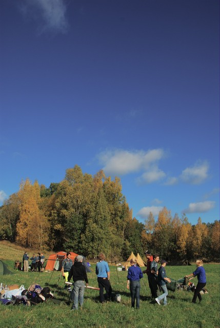 Fellow scouts preparing a camp site