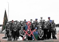 Photo showing only members left in color, the rest of the members in black and white